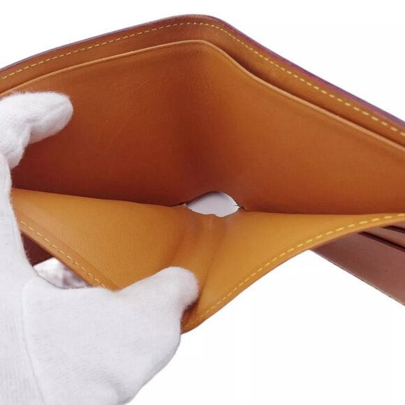 LOUIS VUITTON Bifold Billfold Nomad Taba() Leather Authentic Used - Picture 9 of 11